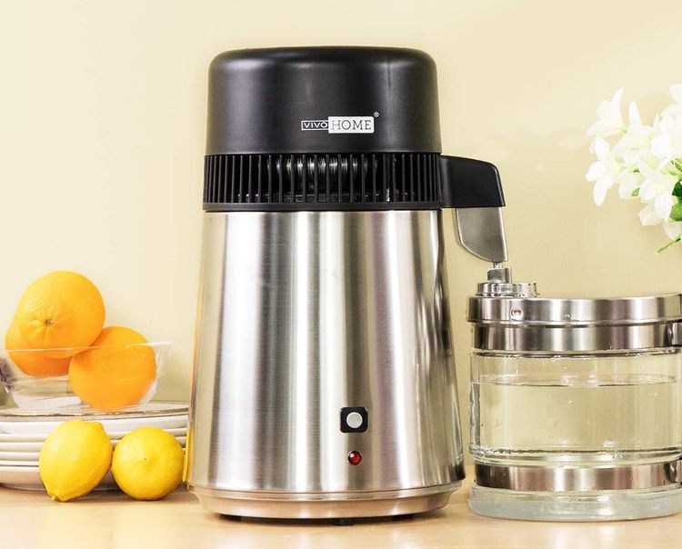 Say goodbye to harmful impurities in your water with the VIVOHOME Water Distiller